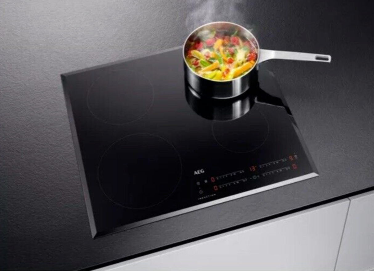 AEG IKB64401FB 60cm Induction Hob in Black Stock photo with pan
