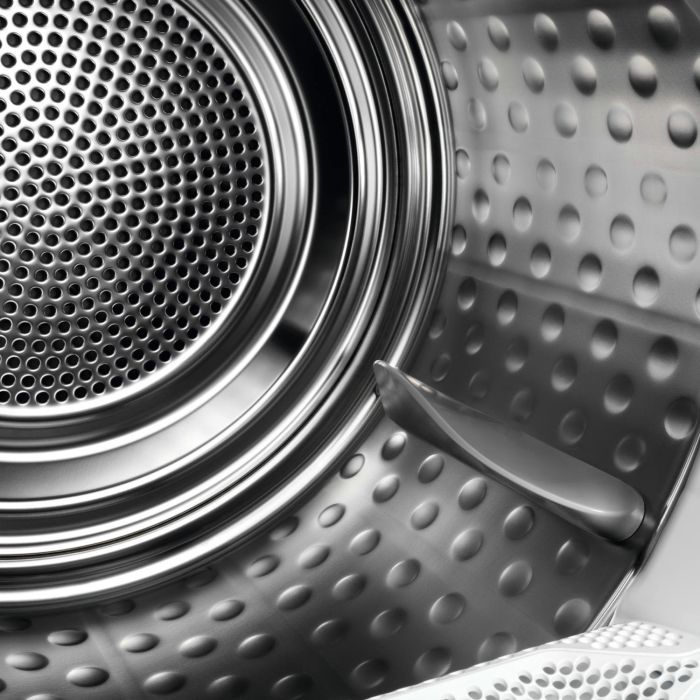 AEG TR718L2B 7000 8KG SensiDry® Heat Pump Tumble Dryer in White - A++ Rated Stock Photo internal drum