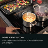 AEG Series 6000 TH84CB03FB 81cm Induction Hob with Venting Extraction in Black - A+ Rated - HW181702-03 from HomeWise Appliances. Stock Photo showing bridge for more room to cook, easily connect two cooking zones to accommodate larger pots and pans.