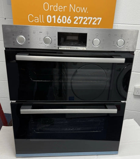 Bosch Series 4 NBS533BS0B Electric Built-Under Electric Double Oven in Stainless Steel from HomeWise Appliances. Showroom photo showing front of oven with doors closed.